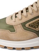 Prada Enamel-Triangle Leather Sneakers